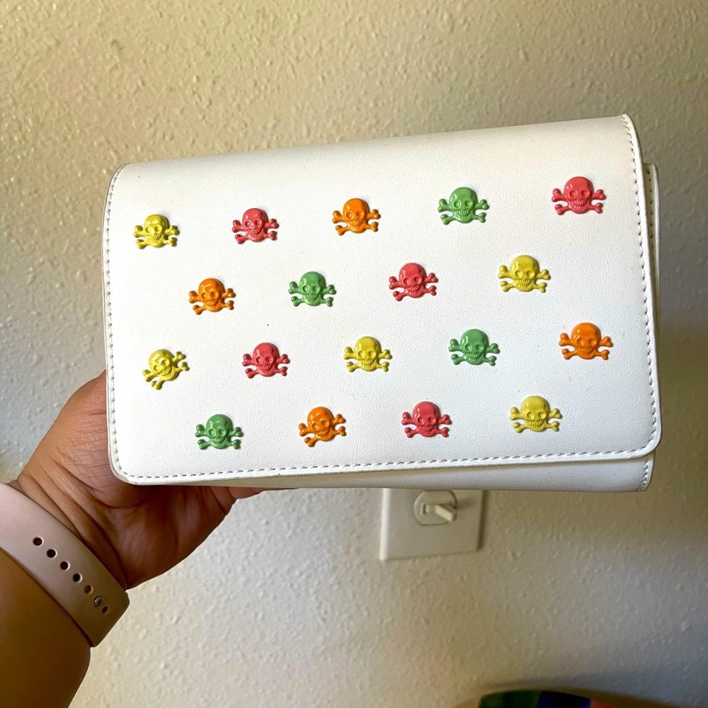 Betsey Johnson colorful skull clutch purse.
